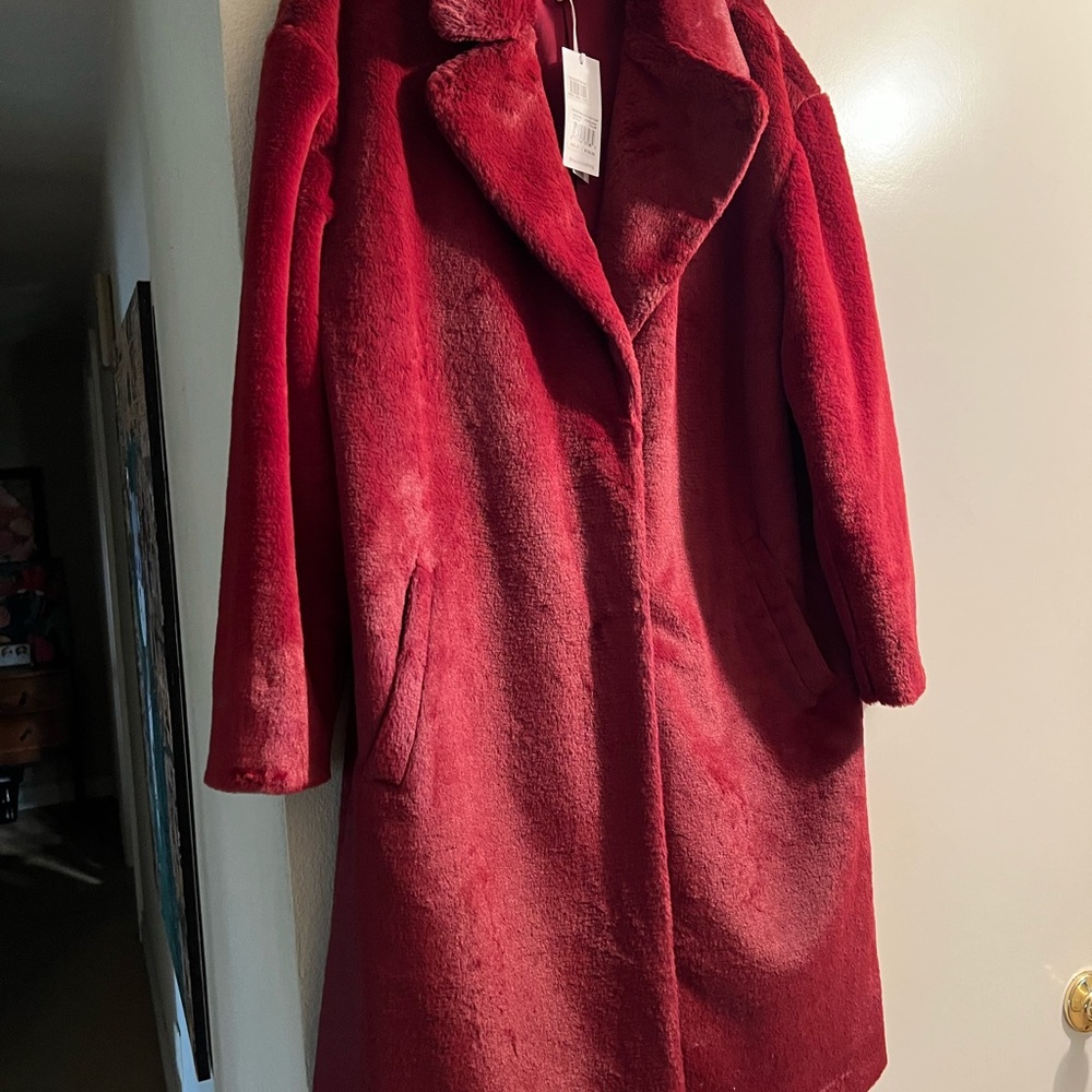 Elegant faux burgundy Women's Coat.. bought at Nordstrom. Fits like medium